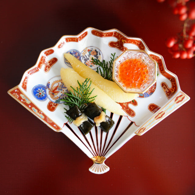 HASAMI WARE RED-OVERGLAZE FAN-SHAPED PLATE WITH PHOENIX DESIGN