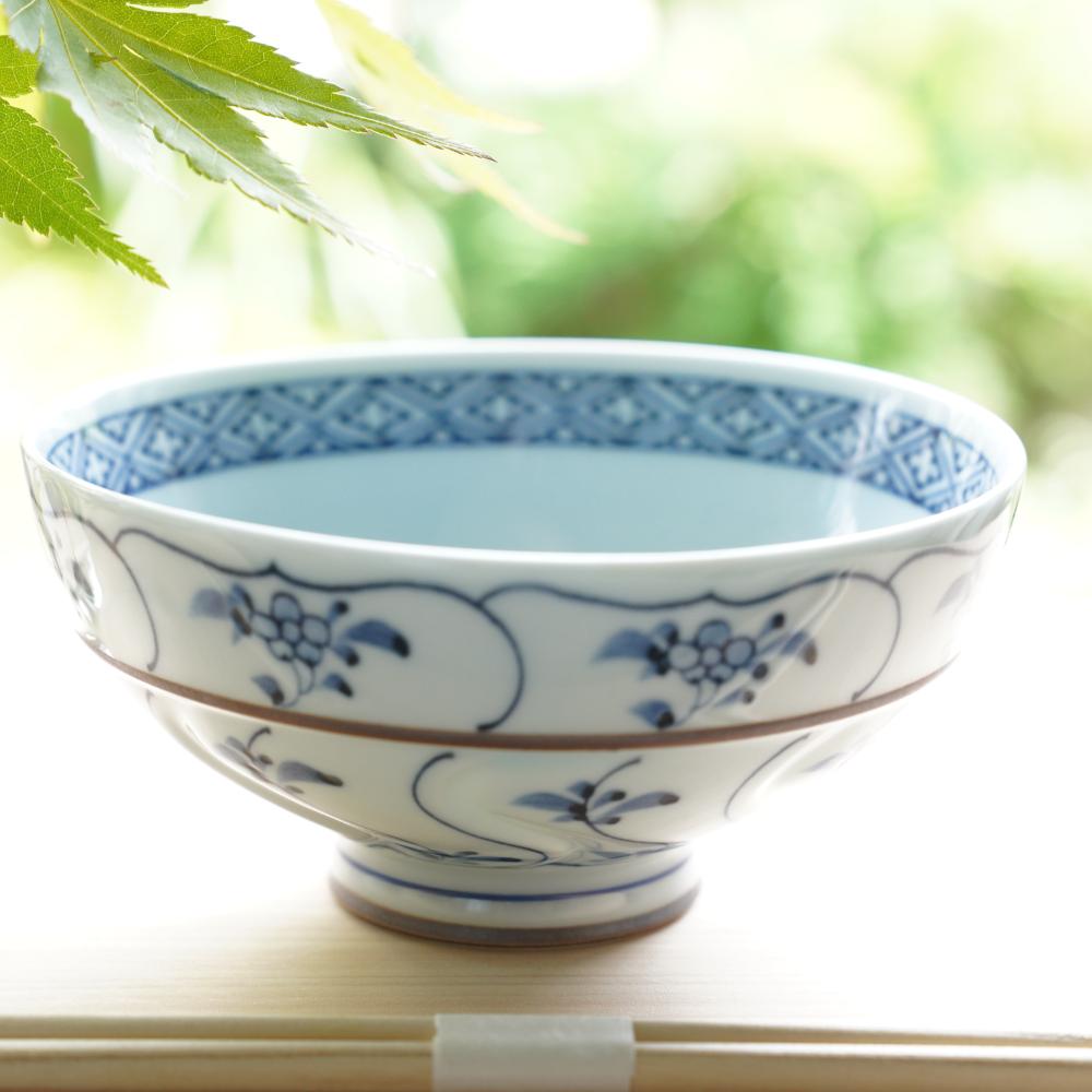 IKKANNJIN CARVED TEA BOWL WITH WILD FLOWERS (LARGE)