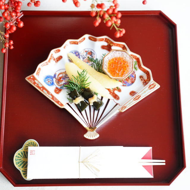 HASAMI WARE RED-OVERGLAZE FAN-SHAPED PLATE WITH PHOENIX DESIGN