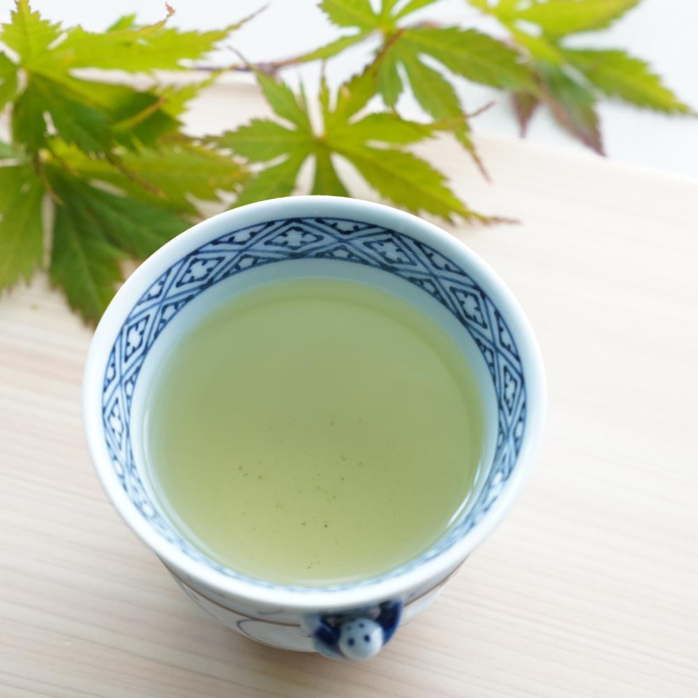 IKKANNJIN CARVED TEACUP WITH WILD FLOWERS (BLUE)