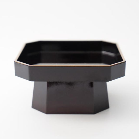 Tame-black sanpo-style serving stand with gold rim