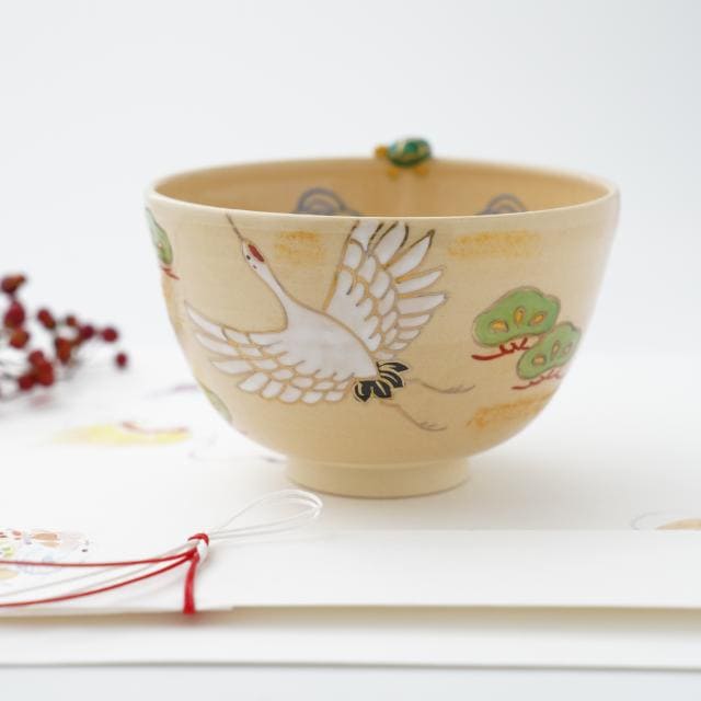 Hand-painted Kyoto matcha bowl with cranes, pine trees and a turtle on the rim