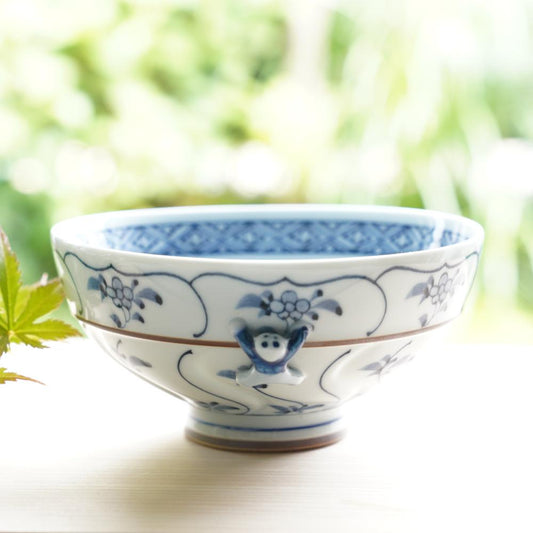 IKKANNJIN CARVED TEA BOWL WITH WILD FLOWERS (LARGE)